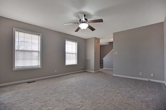 Building Photo - Pet Friendly Three Bedroom with Bonus!