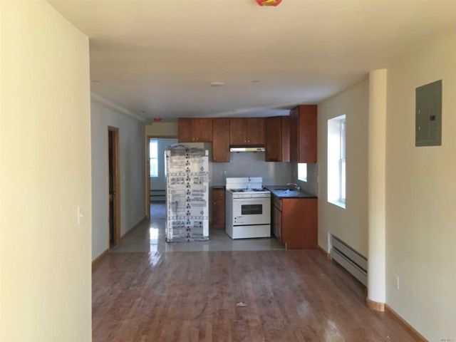 Building Photo - 76-15-76-45 45th Ave