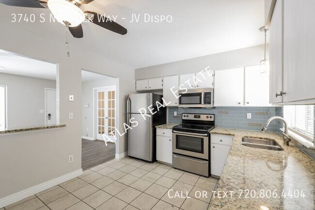 Building Photo - Charming 4 bedroom 3 bath home located in ...