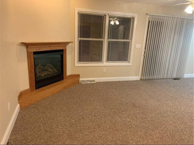Living area with fireplace - 651 N 6th St