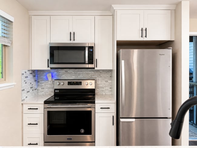Building Photo - Modern Wooded Condo with Upgraded Kitchen & Private Deck
