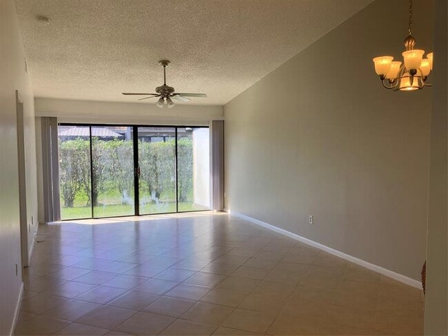 Building Photo - 10128 Boca Bend E
