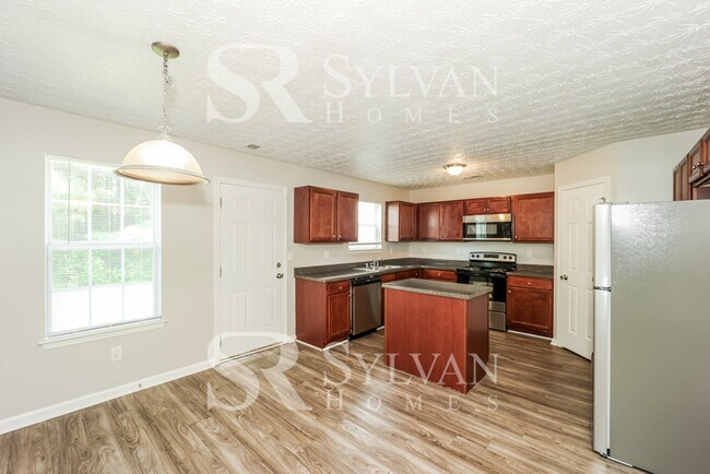 Building Photo - Lease today! No extra charge for contentme...