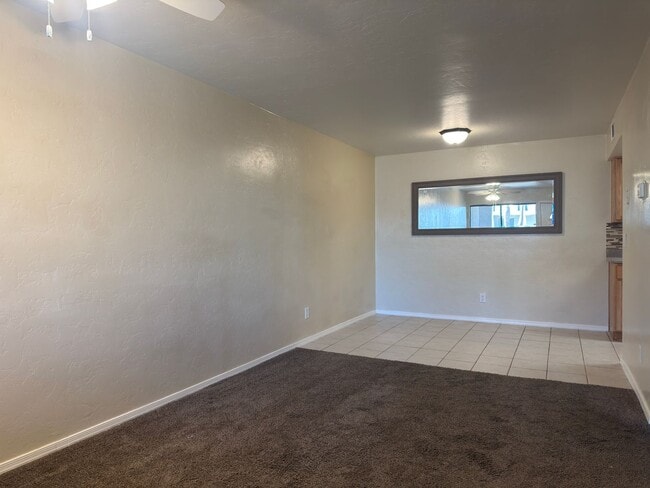 Building Photo - Sun-Drenched 1-Bedroom Condo in Central Tucson | Gated Community with Pool