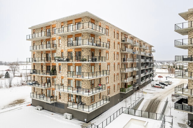 Building Photo - Le STE-C4T