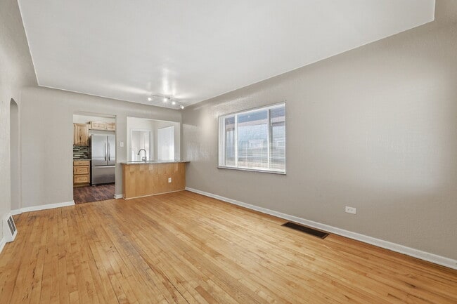 Building Photo - $2,895.95, 3-bed, 2-bath duplex in Denver with a washer and dryer and $300 off the first month's ...