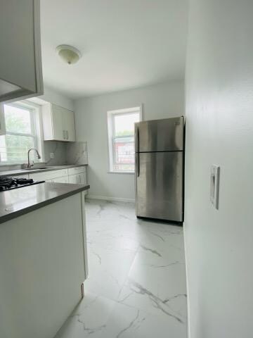 Foto del edificio - 1668 E 32nd St