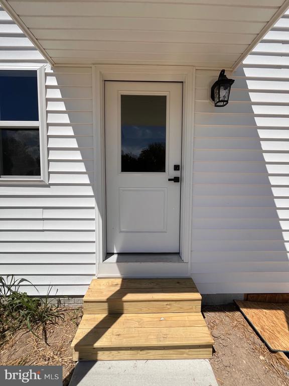 Building Photo - 8641 Sandy Beach Ln