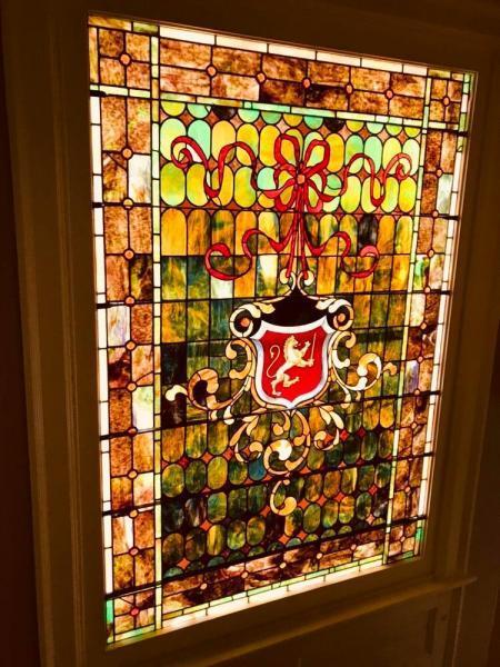 Original stained glass crest - 1049 Franklin Ave