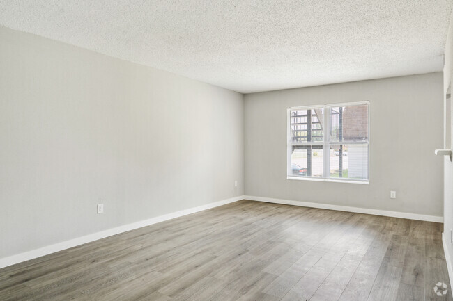 3BR, 2BA - 1194SF - Living Room - Kensington Manor Apartments