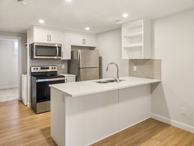 Photo du bâtiment - 102 Silverton Glen Gate SW