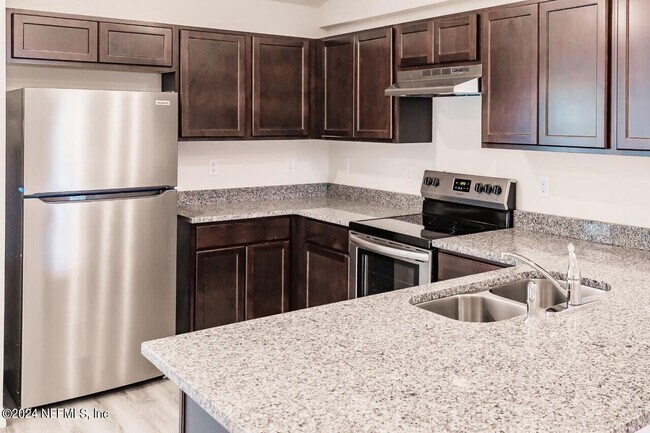 Building Photo - 6450 Sweetbay Ln