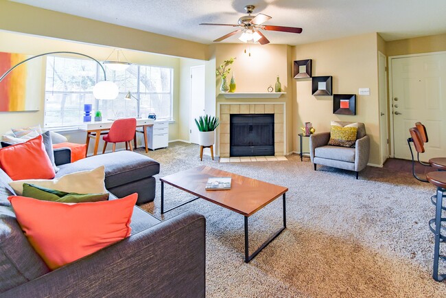 Open concept living room with fireplace at Riverset Luxury Apartments in Memphis, Tennessee - Riverset Apartments