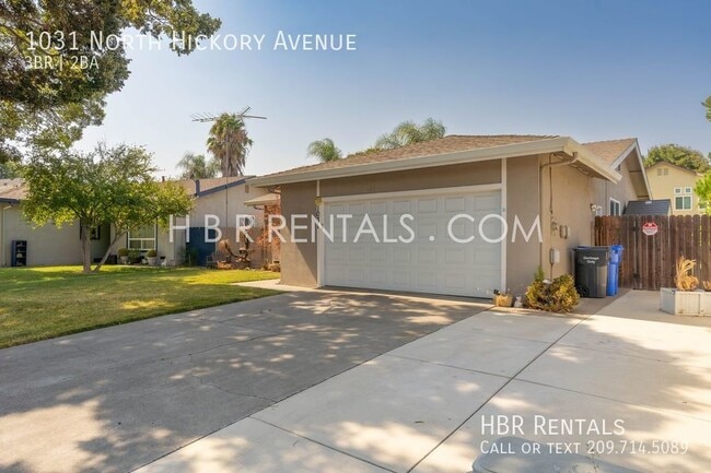 Building Photo - Tracy Three Bedroom Home - Adorable Single...