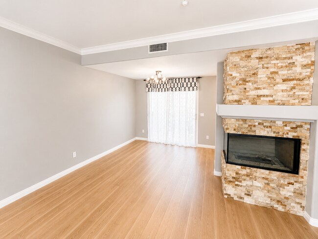 Building Photo - Spacious 3BR Townhome with Solar, Home Gym & 2-Car Garage