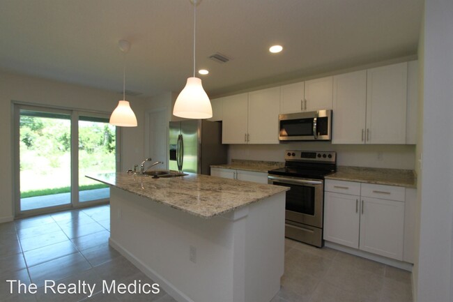 Building Photo - 4 br, 2 bath House - 1798 Tradewinds Ave SE