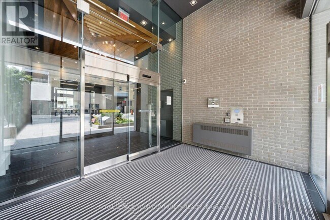 Building Photo - 210-1210 Simcoe St