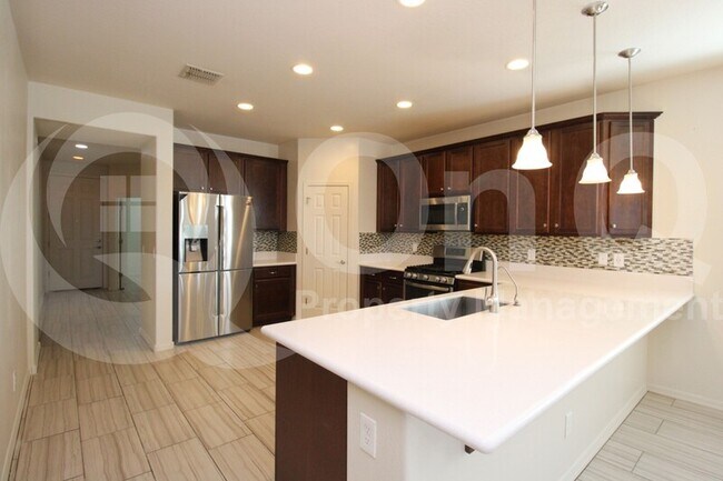 Building Photo - 10151 W Los Gatos Dr