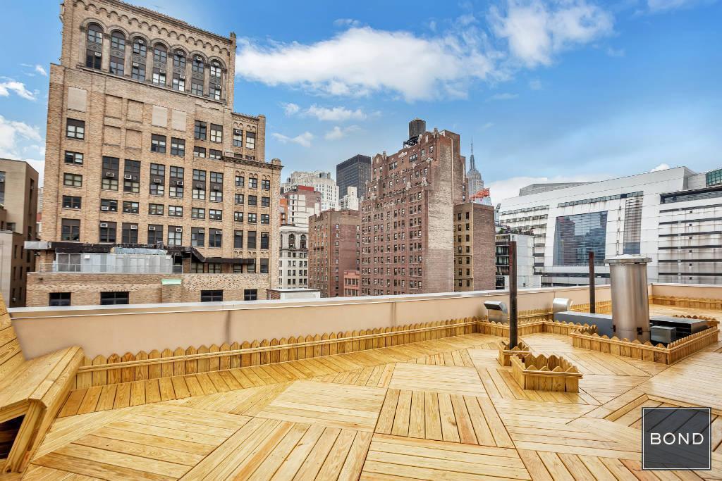 Foto del edificio - 160 E 23rd St