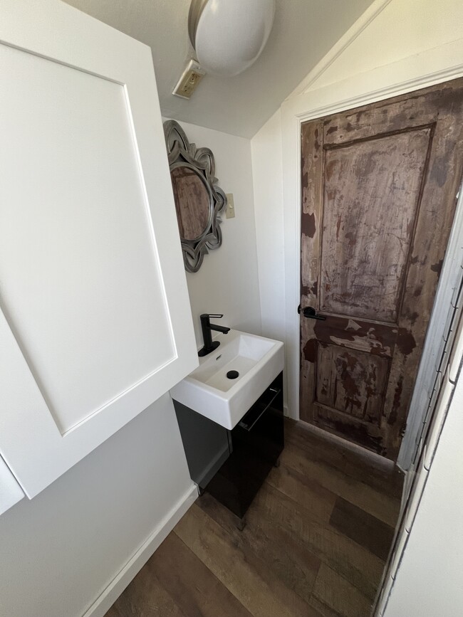 Porcelain sink & linen closet - 1531 State St