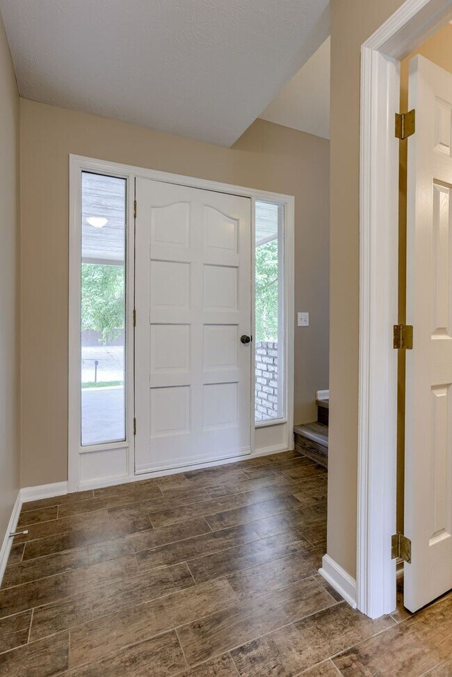 Foto del edificio - Spacious & Bright 3-Bedroom in Prime Milla...