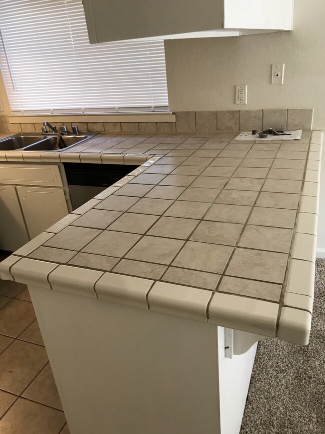 Kitchen counter tile - 7227 Village Green Dr