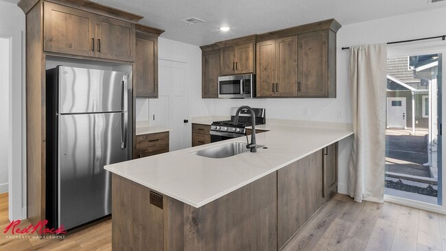 Building Photo - MOVE IN SPECIAL! Fresh, Modern Living, Just Steps Away From Everything in Cedar City