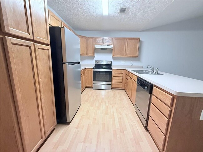 Building Photo - 3977 Hidden Hollow Dr