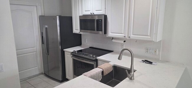 Photo - 47 Tall Oaks Circle, Tequesta, FL 33469 - 1936 House