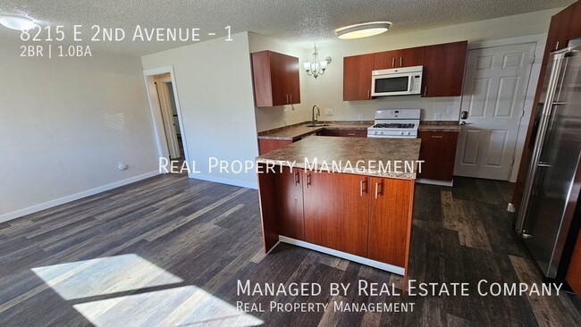 Building Photo - All Utilities Paid Fully Remodeled Ground ...