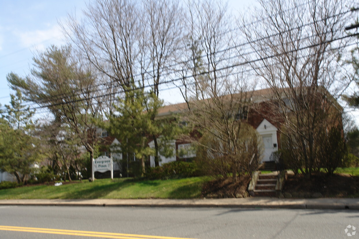Building Photo - Evergreen Pines