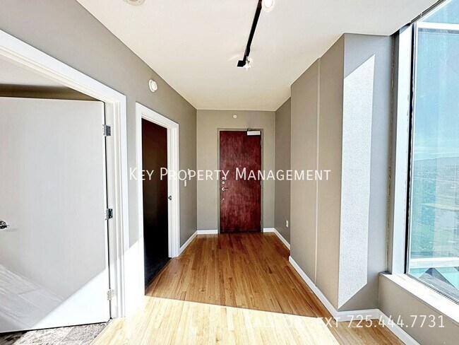 Building Photo - High Rise Metropolis 2 bedroom Condo with ...