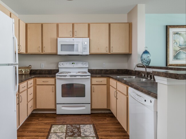 Spacious Kitchen with Breakfast Bar - Tides at Calabash Apartments