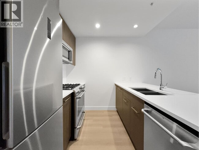 Building Photo - 9060 University Crescent