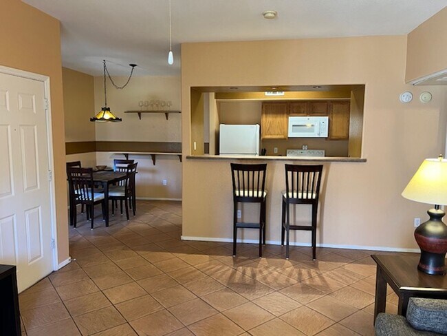 Foto del edificio - Fully Furnished 1st Floor Condo overlooking Park Area  in Gated Tuscano Community – Southwest Las...