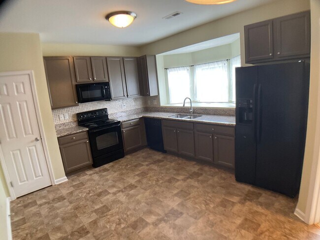 Foto del edificio - 3 Bed, 3.5 Bath Townhome with Garage!