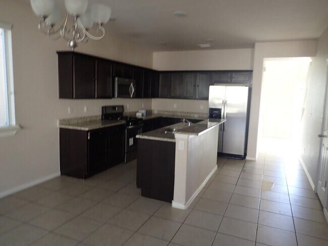 Foto del edificio - 14389 E Cave Ave