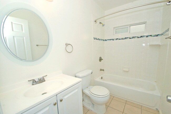 Building Photo - Updated 2 bedroom with GARAGE + Laundry
