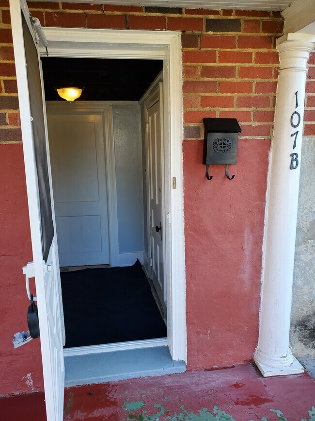 Entrance to the left or apt. - 107 Morgan St