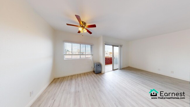 Building Photo - 2 + 2 Spacious 2-Bedroom Condo with Top-Ti...