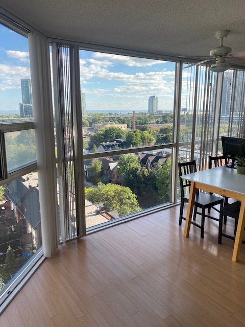 Open, lake view, open plan from Living room to large solarium.. - 725 King St W