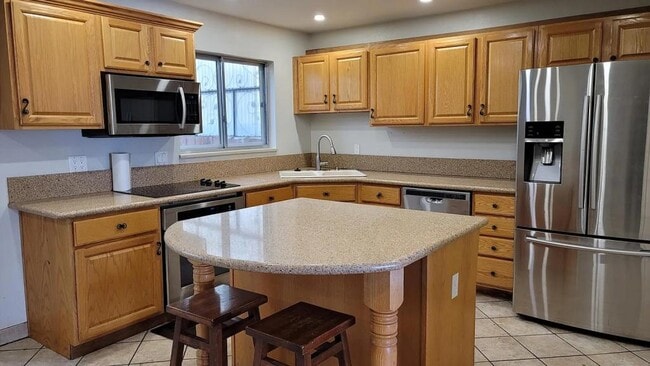 Foto del edificio - 9209 E Nassau Ave