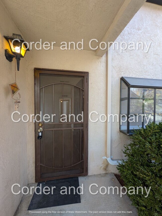 Building Photo - Charming town home 2Bedroom 2Bath Downstairs unit located in the Del Norte High School district.