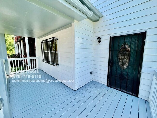 Building Photo - Spacious 4-Bedroom Home with Front Porch a...