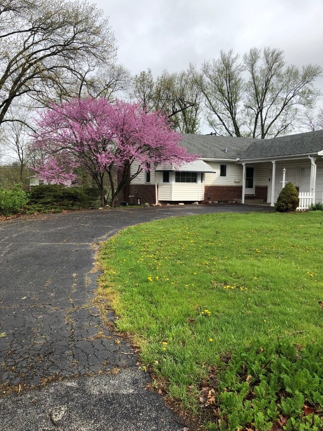 Front in Spring - 6425 N Greenmont Rd
