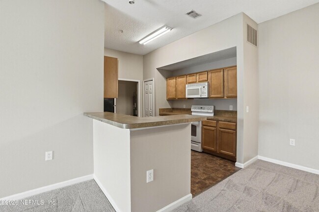 Foto del edificio - 5150 Playpen Dr