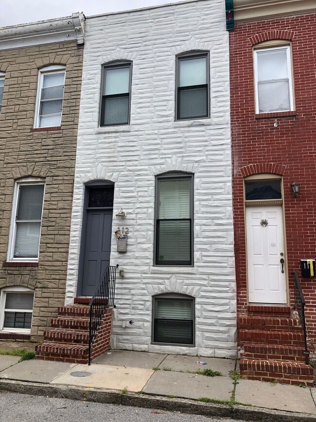 Building Photo - Modern 3 bedroom Patterson Park Home w/ De...
