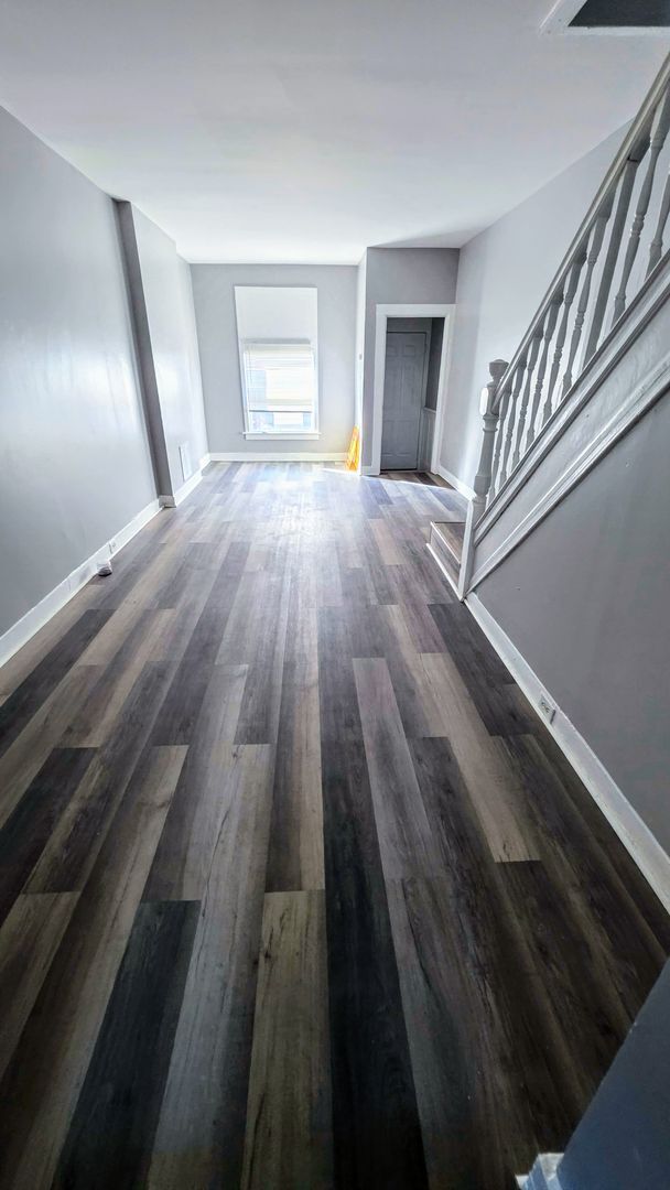 Building Photo - Beautiful Two Bedroom, Plus a Pass Through Room with a Fenced in Rear Patio