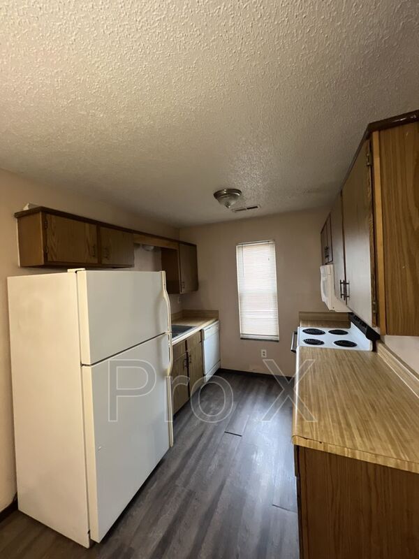 Foto del edificio - 3121 E 12th St