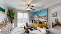 This single-floor residence showcases a thoughtfully designed open-concept layout where the living, dining, and kitchen areas flow seamlessly together. The living room is bright and inviting, with light wood-style flooring, crown molding, and a ceiling fan overhead. A sliding glass door lined with vertical blinds opens to a private balcony, allowing natural light to fill the space. The dining area sits adjacent to the living room and features a round white table with upholstered chairs, accented by bold gold circular wall art that adds a modern artistic touch.

The galley-style kitchen is efficiently laid out with gray cabinetry, white quartz countertops, a subway tile backsplash, and stainless steel appliances including a microwave, electric range, dishwasher, and refrigerator. A pass-through opening connects the kitchen to the dining area, enhancing the open feel.

The bedroom is a calm retreat with ample natural light from double windows, light wood flooring, crown molding, and a ceiling fan. It connects directly to a full bathroom featuring a gray vanity with a white quartz countertop and a tiled tub-shower combination. A generously sized walk-in closet with wire shelving and hanging rods provides excellent storage. Throughout, the warm, cohesive design palette creates a comfortable and well-organized living environment.